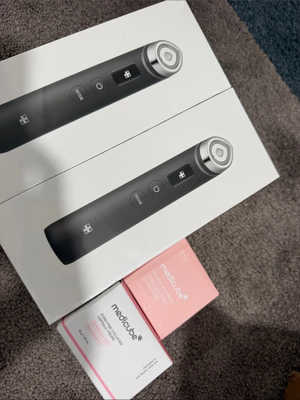 Medicube Black Electronic Cleansing Device with Pink Medicube Skincare